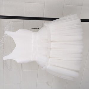 Ashley Lauren Child size 6 Ivory Dress.  .5